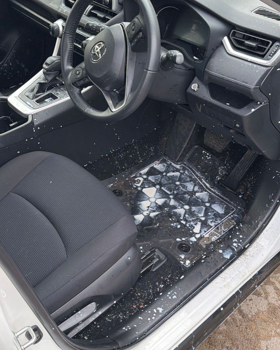 Toyota RAV4 driver's side interior, milk spill through the cabin and then fully detailed — before