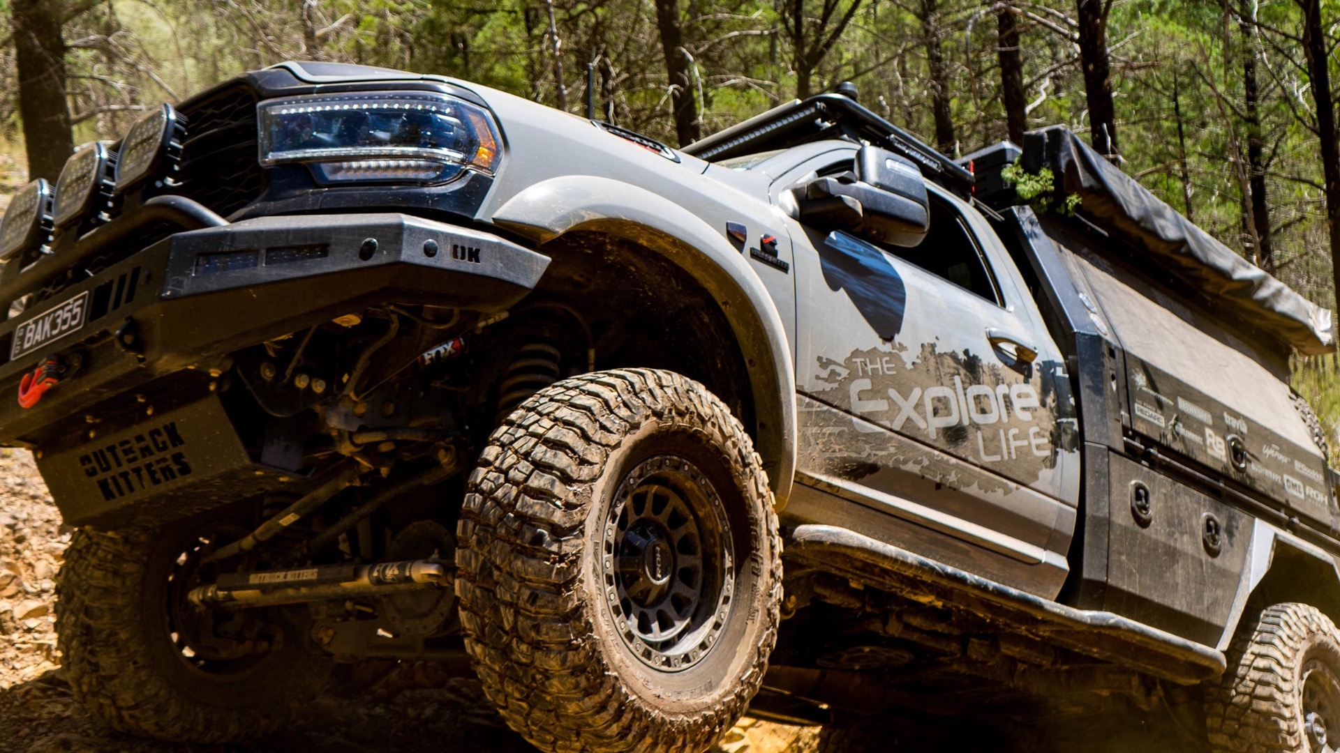 4WD protected with BushWrapz paint protection film on a rocky bush track