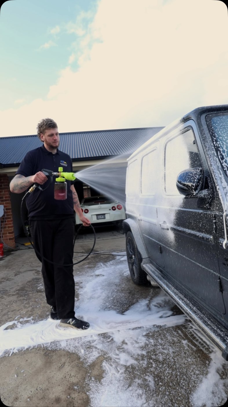 Snow foam being applied during the pre-wash stage